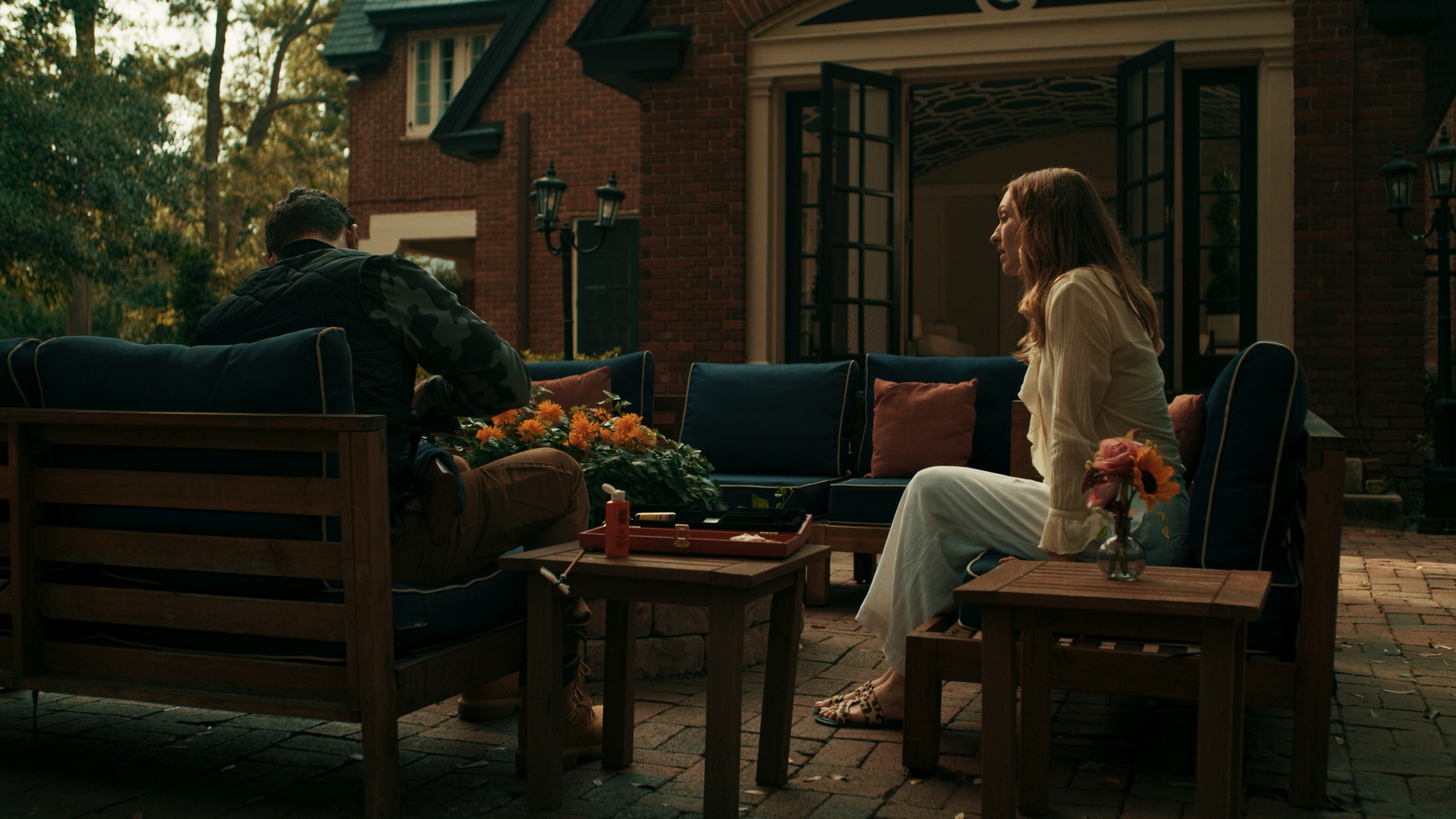 Couple on patio at golden hour